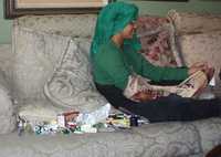  74-reclining-sumana-with-loot.jpg 
