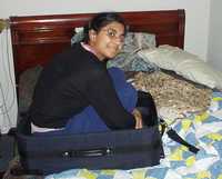  01-sumana-in-suitcase.jpg 