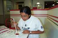  08-sumana-writes-with-ketchup.jpg 