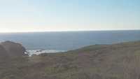  45-ocean-over-field-and-steep-drop.jpg 