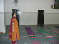  11-Sumana-surveys-the-mats.jpg 