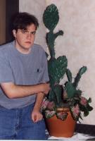 [Fine, I'll stand by the cactus]